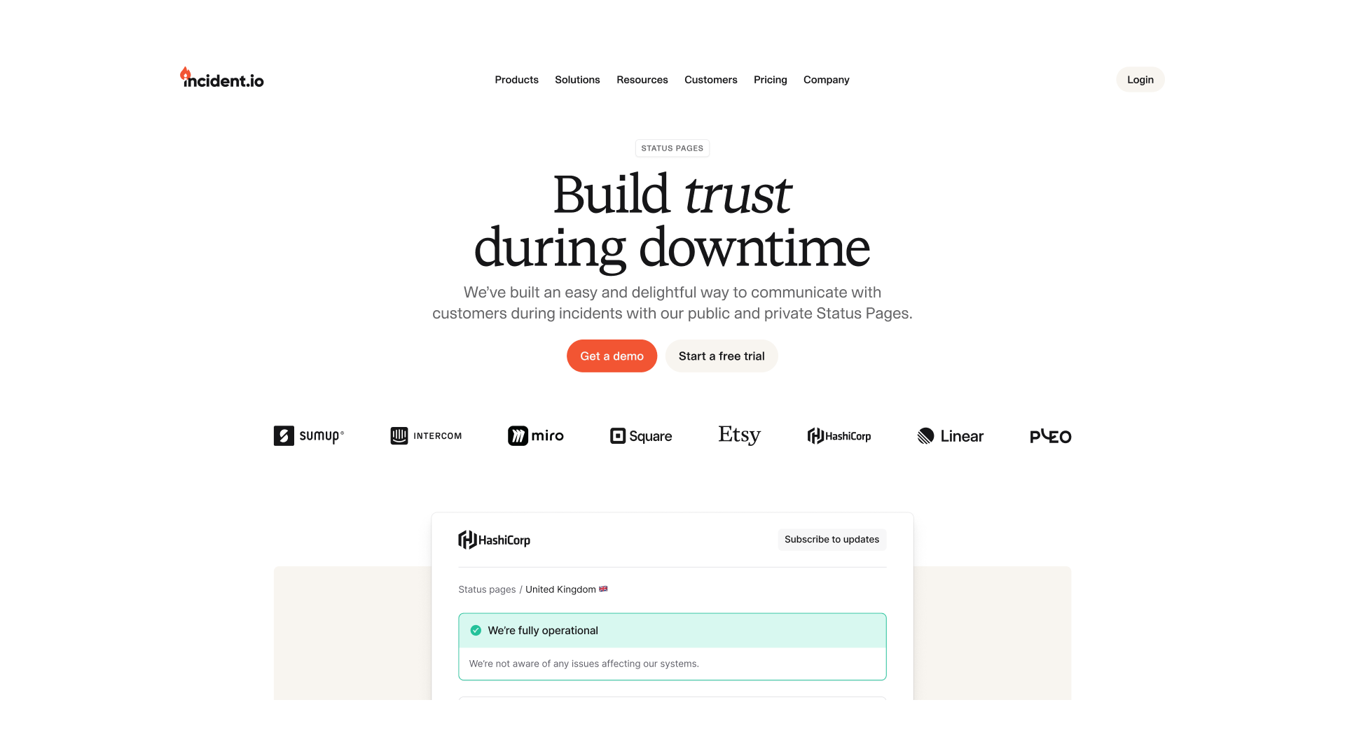 incident.io status-page website with the headline Build trust during downtime and an example status dashboard