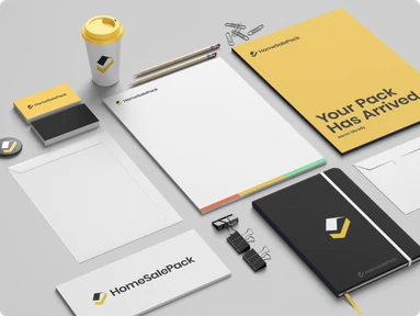 Yellow and charcoal property-brand stationery with a folder, letterhead and business cards